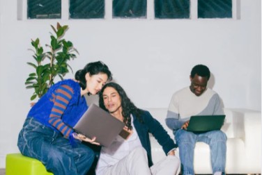 A person looking at a digital device.