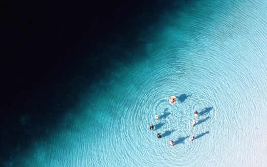 A person looking at a digital device.