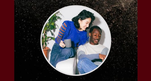 A person looking at a digital device.